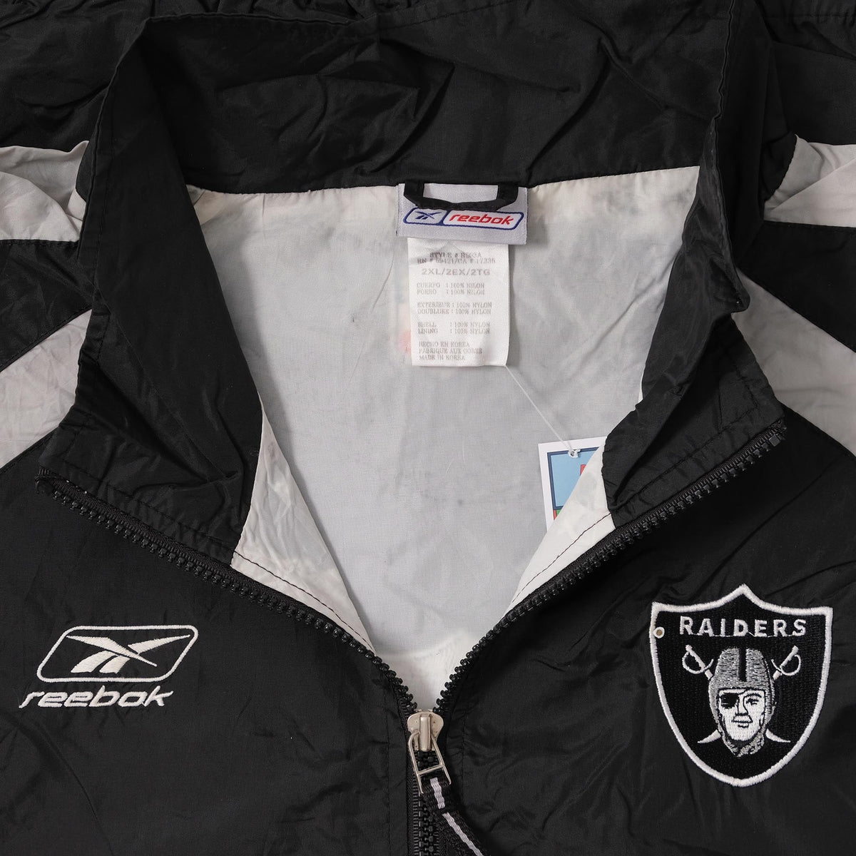 Reebokリーボック × RAIDERSレイダースNFLナイロンジャケット 12227-048_1_1200x1200.jpg?v=