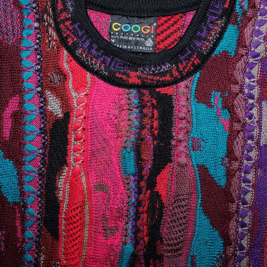 Pink coogi sweater sales