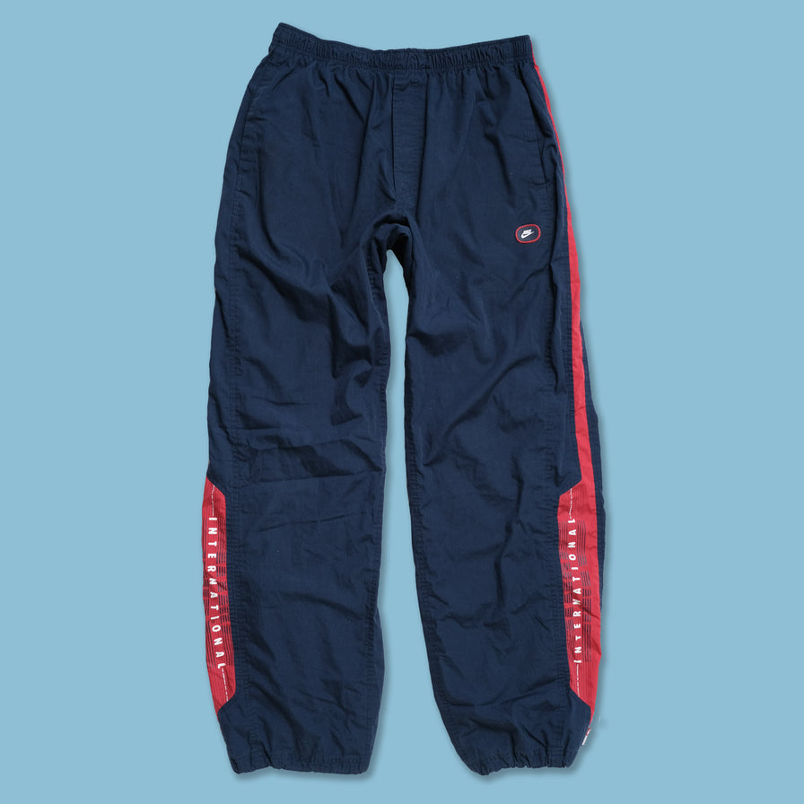 Supreme nike track pants store